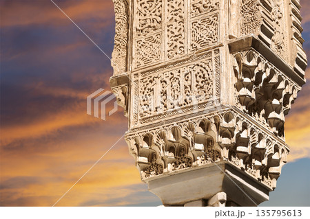 Columns in Islamic (Moorish) style in Alhambra (against the sunset), Granada, Spain Columns in Islamic (Moorish) style in Alhambra (against the sunset), Granada, Spain 135795613