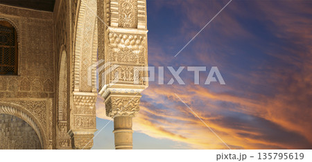 Columns in Islamic (Moorish) style in Alhambra (against the sunset), Granada, Spain Columns in Islamic (Moorish) style in Alhambra (against the sunset), Granada, Spain 135795619