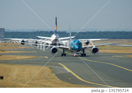 Frankfurt, Germany, July 9, 2017: Boeing 787 and Airbus A380 on Taxiway at Frankfurt Airport 135795724