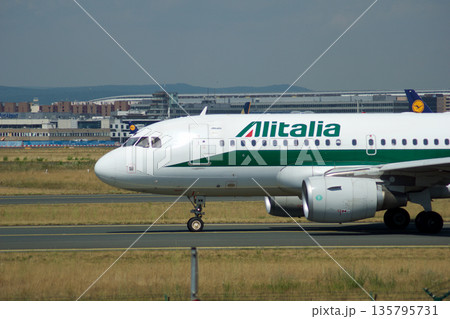 Frankfurt, Germany, July 09 2017: Italian Airbus A320 Taxiing Past Spotting Point Toward Runway 135795731