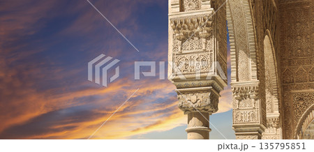 Columns in Islamic (Moorish) style in Alhambra (against the sunset), Granada, Spain Columns in Islamic (Moorish) style in Alhambra (against the sunset), Granada, Spain 135795851