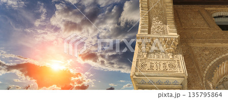 Columns in Islamic (Moorish)  style in Alhambra (against the sunset), Granada, Spain 135795864
