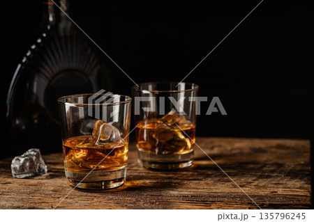 Whiskey with ice in glasses 135796245
