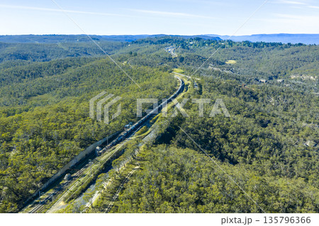 Drone photograph of a train in the Grose Valley in the Blue Mountains 135796366