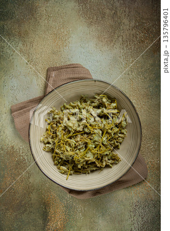 Jonjoli, Colchian klekachka, Georgian appetizer, pickled jonjoli, no people Jonjoli, Colchian klekachka, Georgian appetizer, pickled jonjoli, no people 135796401