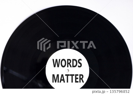 Words matter symbol. Concept word Words matter on beautiful black and white vinyl disk. Beautiful white paper background. Business words matter concept. Copy space. 135796852