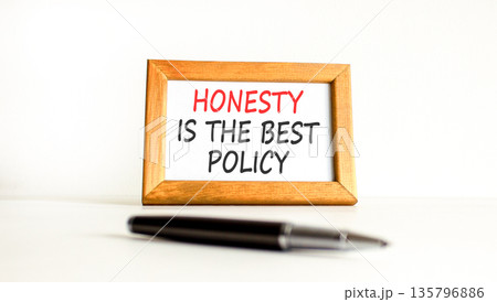 Honesty is the best policy symbol. Concept words Honesty is the best policy on beautiful wooden picture frame. Beautiful white background. Business honesty is the best policy concept. Copy space. Honesty is the best policy symbol. Concept words Honesty is the best policy on beautiful wooden picture frame. Beautiful white background. Business honesty is the best policy concept. Copy space. 135796886