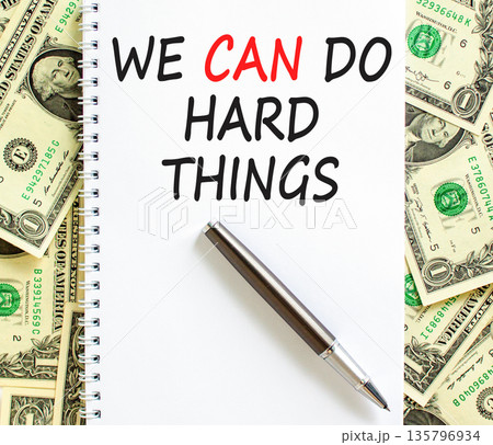 Support, help we can do hard things symbol. Concept words We can do hard things on beautiful white note. Beautiful dollar bills background. Business we can do hard things concept. Copy space. 135796934