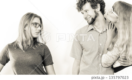 Jealous woman with happy couple 135797023