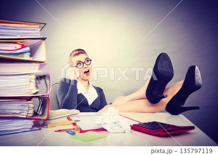 Secretary making phone call. 135797119