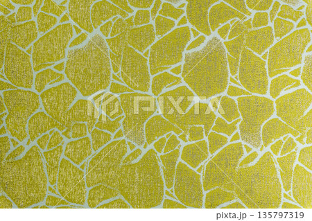 Mustard yellow textile texture with golden cracked mosaic motif Mustard yellow textile texture with golden cracked mosaic motif 135797319