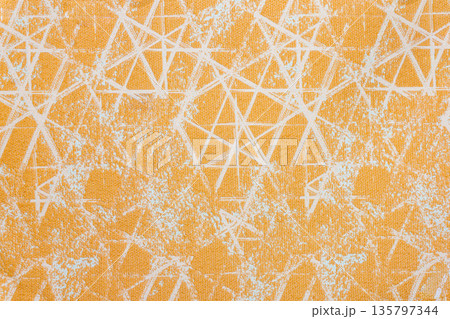 Dark teal textile with white geometric line pattern and gold accents 135797344