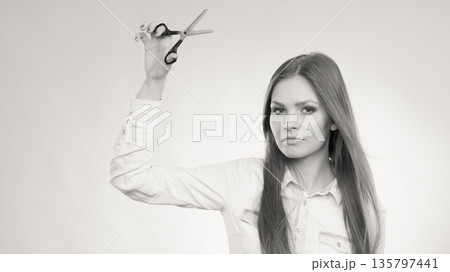 Smiling lady showing tools. 135797441