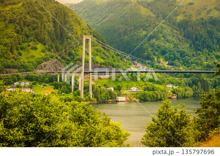 Osteroy suspension bridge in Norway, only road connection island with the mainland east area of Bergen 135797696