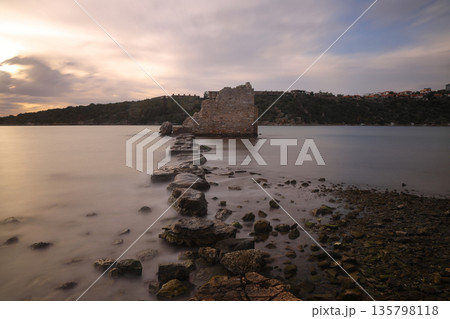 Ruined and restored castle at Iasos Turkey on the Aegean Sea near Bodrum. Long Exposure shoot. tranquility scene. Ruined and restored castle at Iasos Turkey on the Aegean Sea near Bodrum. Long Exposure shoot. tranquility scene. 135798118