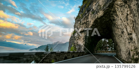 A scenic road in the Italian Alps. Hiking trails in the Dolomite Alps. High quality photo A scenic road in the Italian Alps. Hiking trails in the Dolomite Alps. High quality photo 135799126