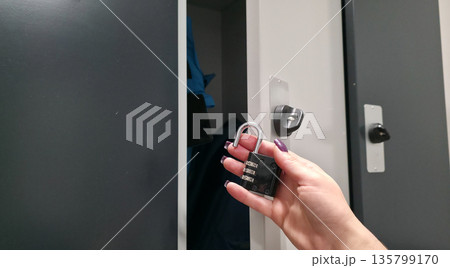 A lock with a code mechanism. Protection of personal belongings using a lock with a code mechanism in lockers. High quality photo 135799170