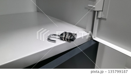 A lock with a code mechanism. Protection of personal belongings using a lock with a code mechanism in lockers. High quality photo 135799187