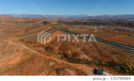 Aerial view of desert terrain with highway and housing near Mesquite Aerial view of desert terrain with highway and housing near Mesquite 135799984
