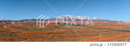Panoramic view of red desert and snowy mountains in Nevada Panoramic view of red desert and snowy mountains in Nevada 135800077
