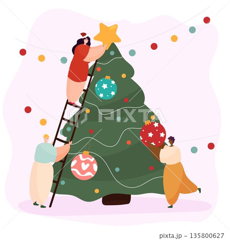 Friends decorate Christmas tree for Christmas 135800627