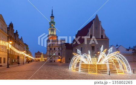 Poznan Old Market Square with illuminated fountain and colorful buildings 135802265