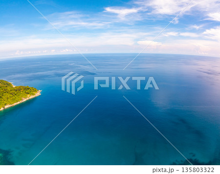 Beautiful sea in summer season blue sky white cloud background 135803322