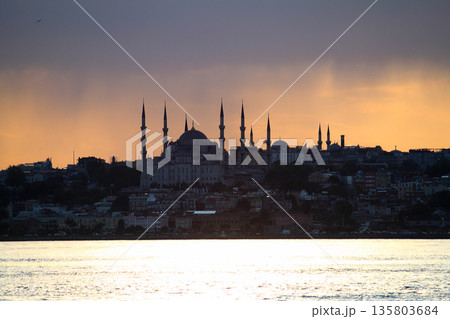 Sillhouette of Istanbul at sunset. Ramadan time with the muslim city istanbul silhouette Sillhouette of Istanbul at sunset. Ramadan time with the muslim city istanbul silhouette 135803684
