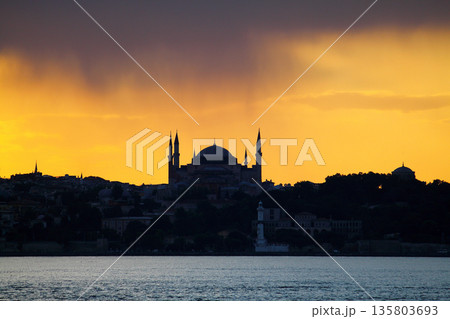 Sillhouette of Istanbul at sunset. Ramadan time with the muslim city istanbul silhouette Sillhouette of Istanbul at sunset. Ramadan time with the muslim city istanbul silhouette 135803693
