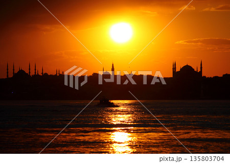 Sillhouette of Istanbul at sunset.  Ramadan time with the muslim city istanbul silhouette 135803704