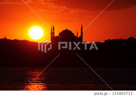 Sillhouette of Istanbul at sunset. Ramadan time with the muslim city istanbul silhouette Sillhouette of Istanbul at sunset. Ramadan time with the muslim city istanbul silhouette 135803713