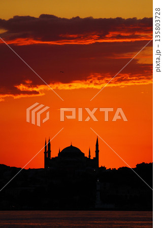 Sillhouette of Istanbul at sunset.  Ramadan time with the muslim city istanbul silhouette 135803728