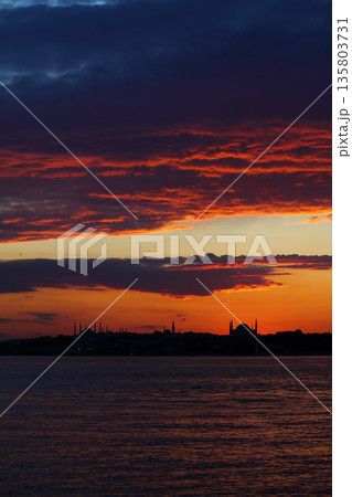 Sillhouette of Istanbul at sunset.  Ramadan time with the muslim city istanbul silhouette 135803731