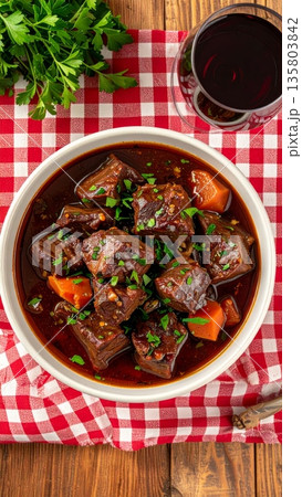 Beef Stew in Red Wine on Gingham Tablecloth 135803842
