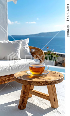Chamomile Tea on Wooden Coffee Table by Mediterranean Balcony Chamomile Tea on Wooden Coffee Table by Mediterranean Balcony 135803864