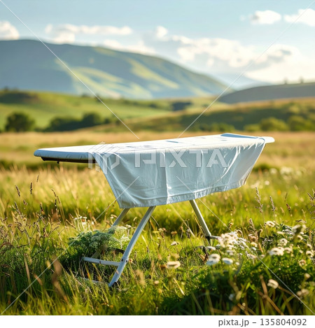 Ironing Board in the Middle of Wide Green Field Ironing Board in the Middle of Wide Green Field 135804092