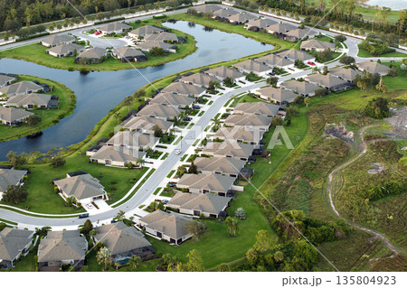 Wealthy neighborhood with expensive houses in southern Florida. Development of US premium housing market 135804923