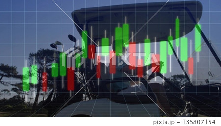 Driving male golfer steering golf cart on fairway, with golf clubs and stock chart overlay 135807154