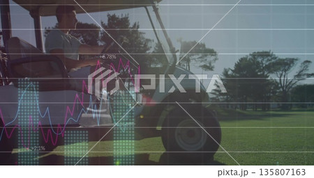 Driving golfer wearing polo shirt, shorts on fairway in golf cart, with data graphs and trees 135807163