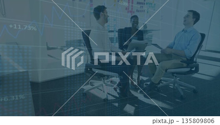 Staff wearing suits holding papers and discussing plans in meeting with sticky notes 135809806