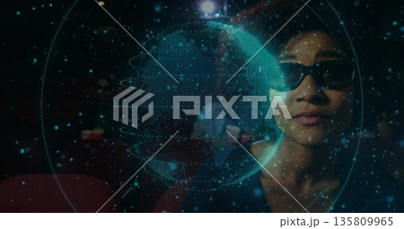 Woman wearing VR glasses inspecting globe and digital points in theater, copy space Woman wearing VR glasses inspecting globe and digital points in theater, copy space 135809965