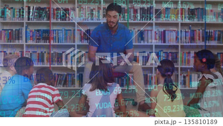 Reading bearded man engaging six children with tablet near bookshelves with stock ticker overlay Reading bearded man engaging six children with tablet near bookshelves with stock ticker overlay 135810189