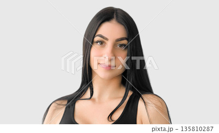 Young charm. Model girl. Natural portrait of woman with healthy glowing face skin. Attractive female isolated on white. 135810287