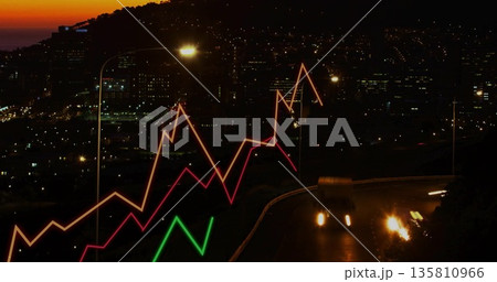 Commercial truck rounding curve on hillside road over city, with translucent graphs, copy space 135810966