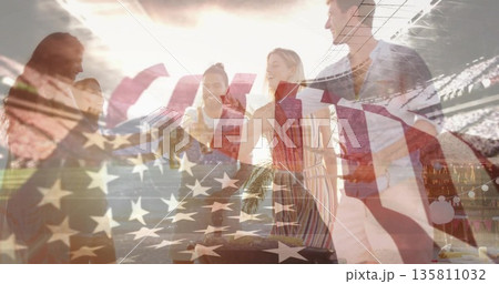 Dancing five friends holding hands in sunset stadium seating, with American flag overlay and lights Dancing five friends holding hands in sunset stadium seating, with American flag overlay and lights 135811032
