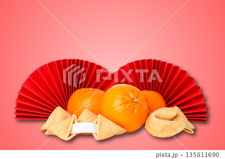Festive oranges and red paper fans create a joyful atmosphere 135811690
