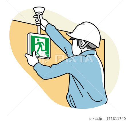 誘導灯を取付する男性作業員 135811740