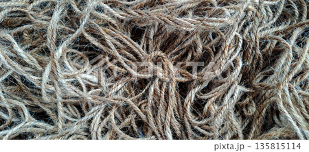 High Angle Close Up of Natural Brown Jute Rope Tangle Texture Background High Angle Close Up of Natural Brown Jute Rope Tangle Texture Background 135815114