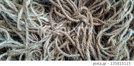 Messy Pile of Natural Hemp Twine Rope for Industrial and Craft Background Messy Pile of Natural Hemp Twine Rope for Industrial and Craft Background 135815115