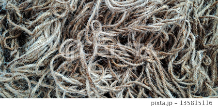 Top View of Intertwined Natural Fiber Ropes Texture for Rustic Background 135815116